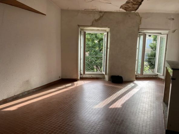Aubaens Appartement T2 bis lumineux avec potentiel et faible charge
