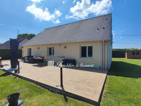 Belle maison de plain-pied proche Beaumont-le-Roger avec jardin et dépendances