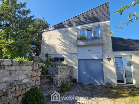 Maison 111m² avec jardin et garage à Laon - Potentiel à saisir