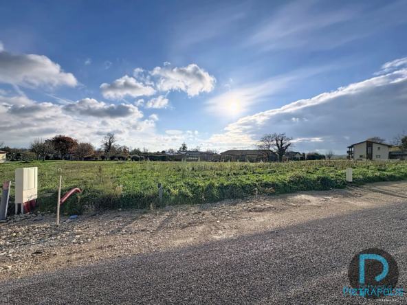 Terrain à bâtir de 718 m² à Chaveyriat avec vue dégagée et viabilisation complète