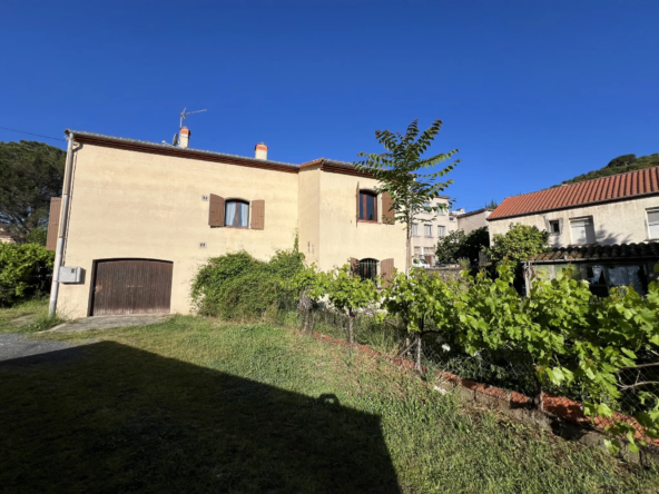Maison rénovée avec logement indépendant et garage à Arles-sur-Tech