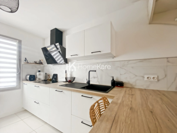 Maison mitoyenne lumineuse avec jardin à Merville 63m²