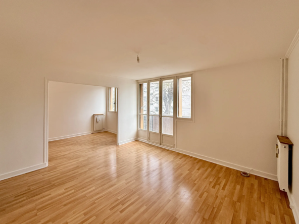 Appartement T4 avec balcon, parking et cave au centre-ville d'Eaubonne