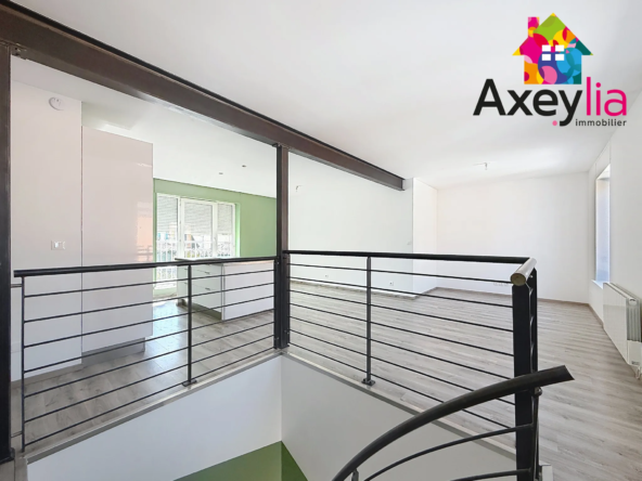 A vendre appartement duplex en secteur calme avec garage et terrain au Coteau