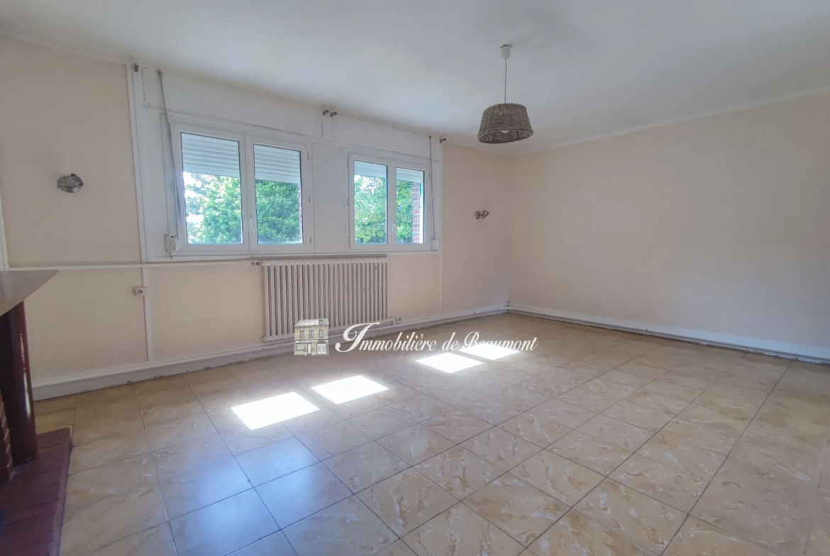 Maison à vendre à Beaumont le Roger avec jardin, garage et potentiel d'aménagement 