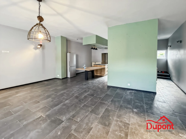 Maison semi-individuelle à Thun-Saint-Amand avec jardin et potentiel d'extension