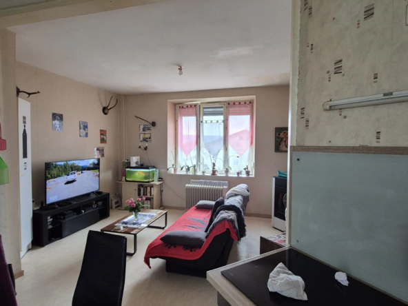 Maison mitoyenne louée avec jardin à Blagny – Opportunité d'investissement