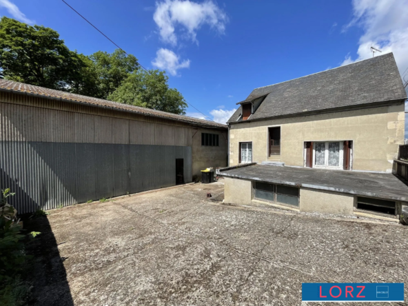 Maison avec hangar à Bourges - Opportunité d'investissement et de rénovation