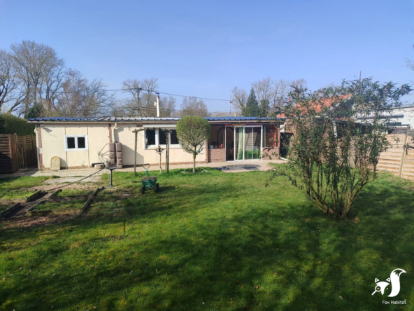 Charmant chalet à Hamel sur terrain de 1005 m² avec terrasse et garage