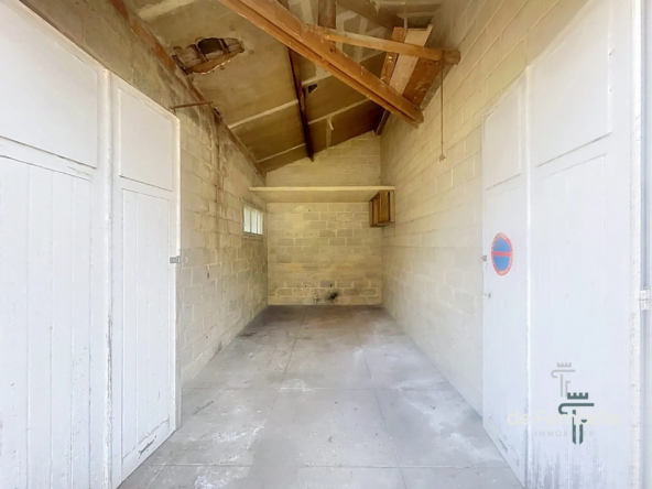 Garage sécurisé en hyper centre de Falaise avec mezzanine