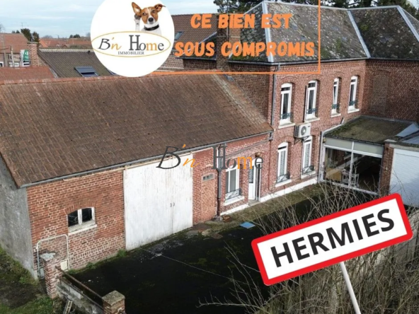 Maison de caractère à Hermies à rénover avec grands garages et jardin clos