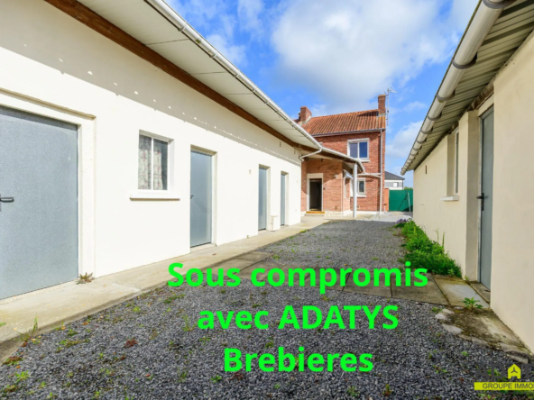 Maison mitoyenne avec 4 chambres, garage et jardin à Leforest