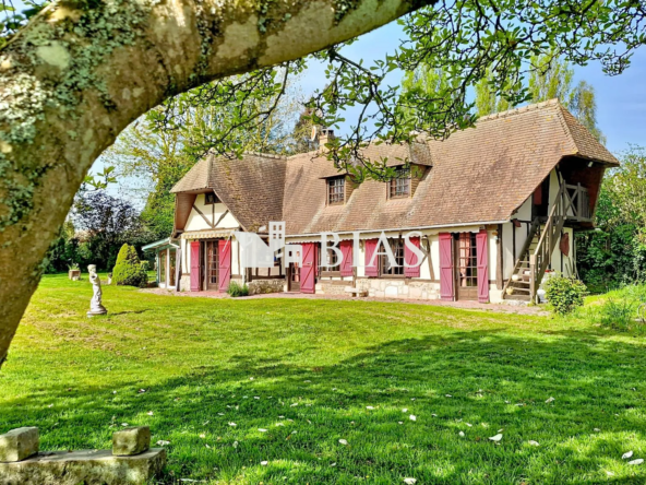 Maison normande à vendre à Grand Bourgtheroulde avec jardin et potentiel de rénovation
