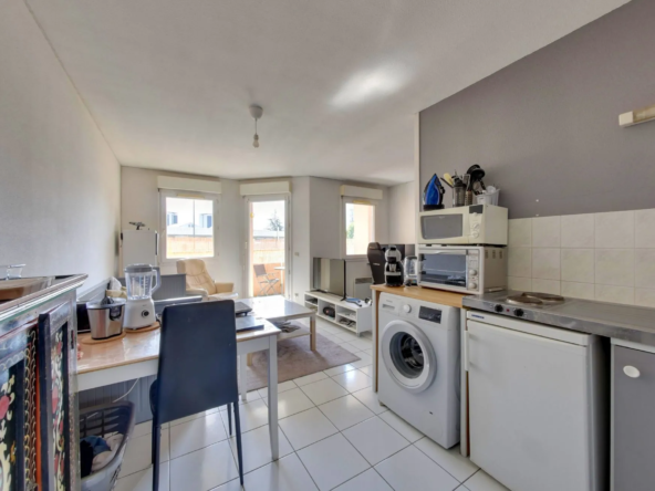 Appartement T1 bis loué à Grenoble avec balcon, garage et cave - Investissement immobilier