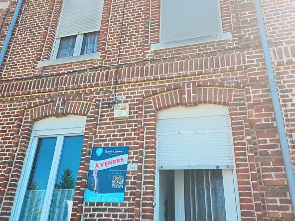 Maison à vendre à Hautmont – Opportunité d'investissement avec jardin et cave