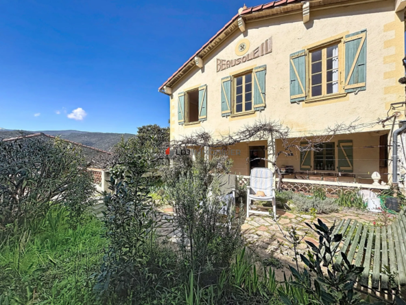 Maison de charme à Ria-Sirach avec potentiel et vue montagne