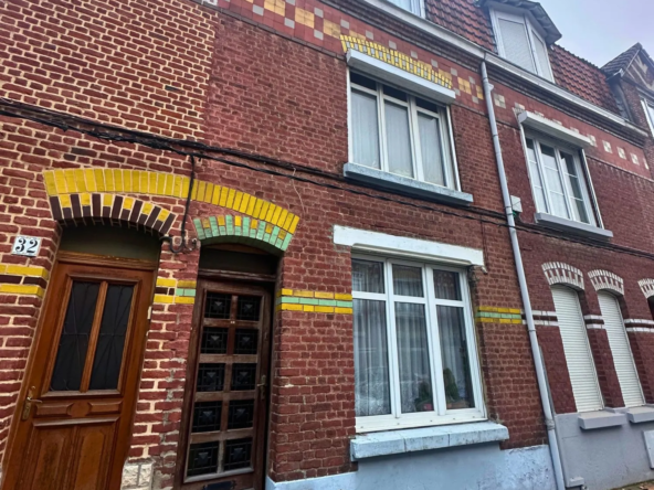 Maison à rénover de 1930 avec 4 chambres et jardin à Lille