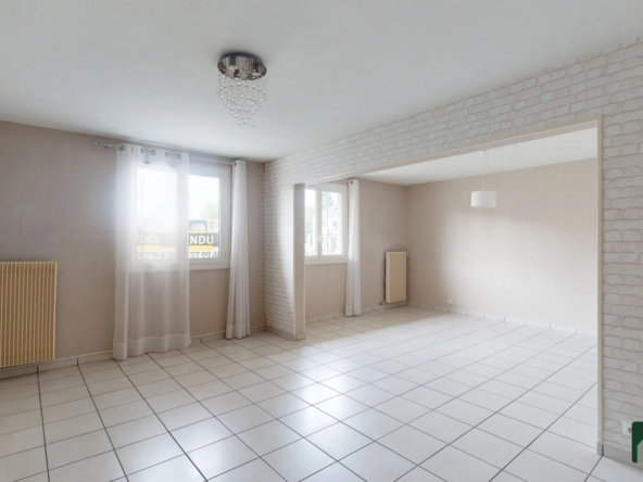 Appartement T5 centre-ville de Lucé avec cave et ascenseur, idéal pour famille ou investisseur
