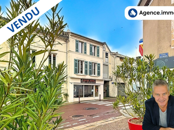 Immeuble de rapport à Mirambeau avec local commercial loué et appartement rénové