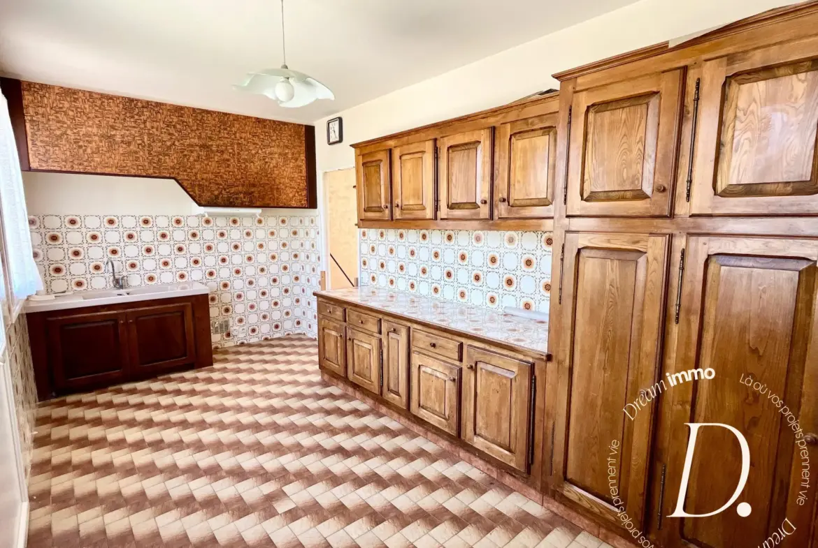 Maison de plain-pied avec grand terrain à Lannemezan – Potentiel de rénovation 