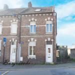 Maison de ville semi-mitoyenne à Sin-le-Noble avec 4 chambres, jardin et potentiel de rénovation