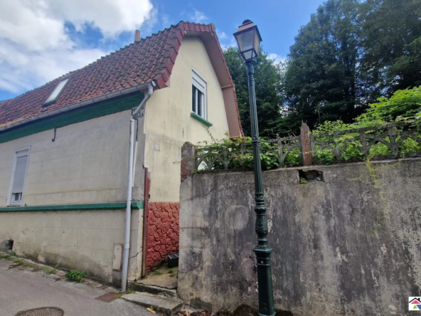 Maison à rénover avec jardin et dépendance à Saint-Pol-sur-Ternoise