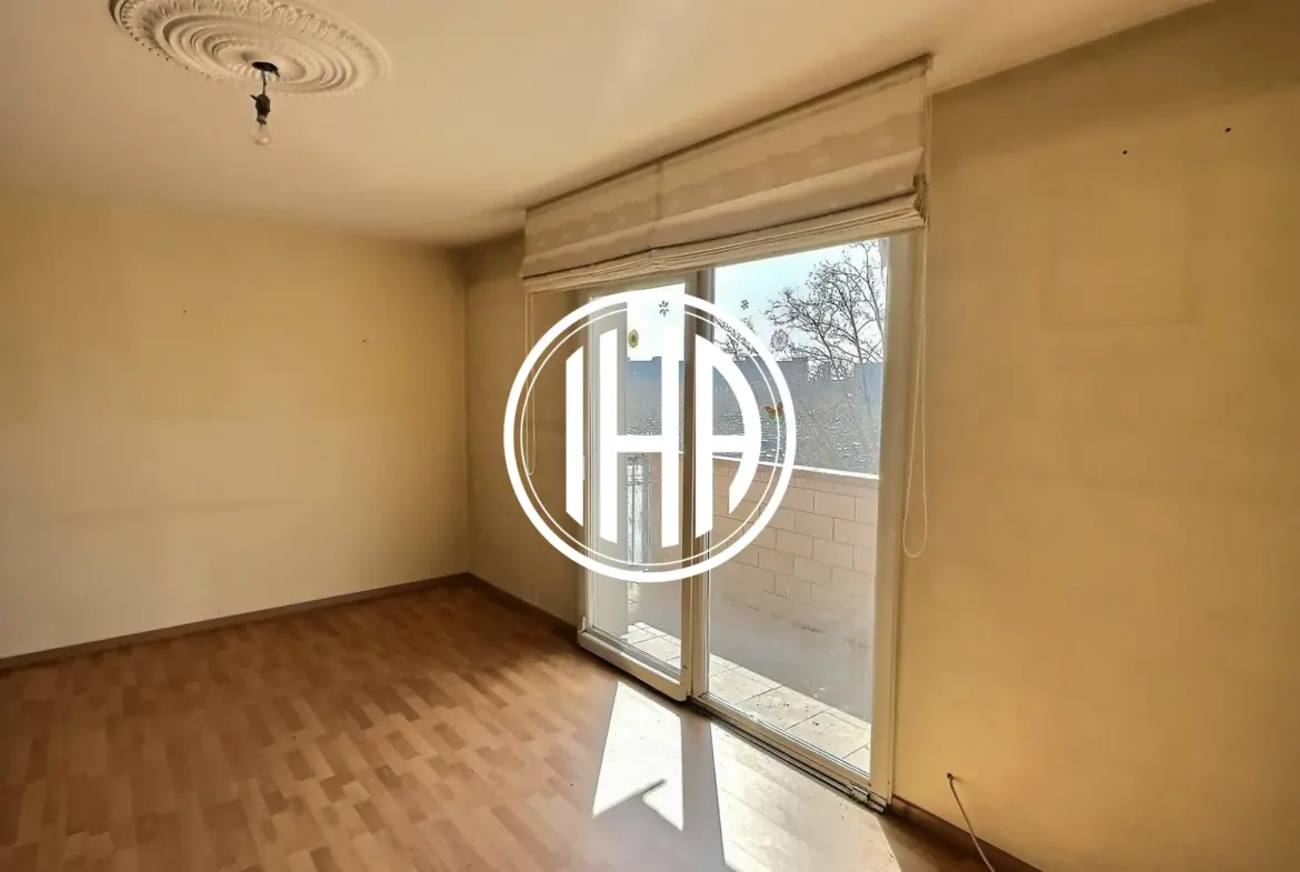 Appartement T5 à vendre à Colmar avec balcon, cave et exposition sud 