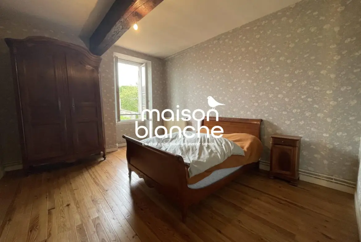 Belle maison en pierre avec jardin et potentiel à Blasimon 
