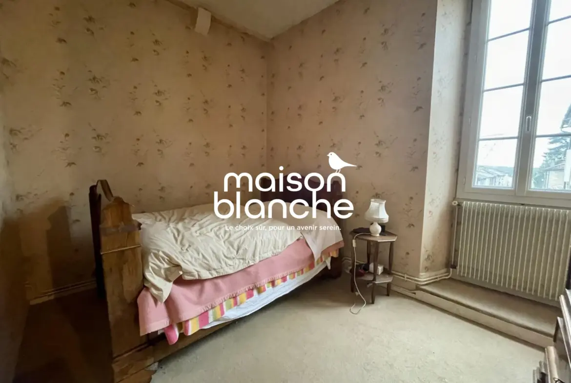 Belle maison en pierre avec jardin et potentiel à Blasimon 