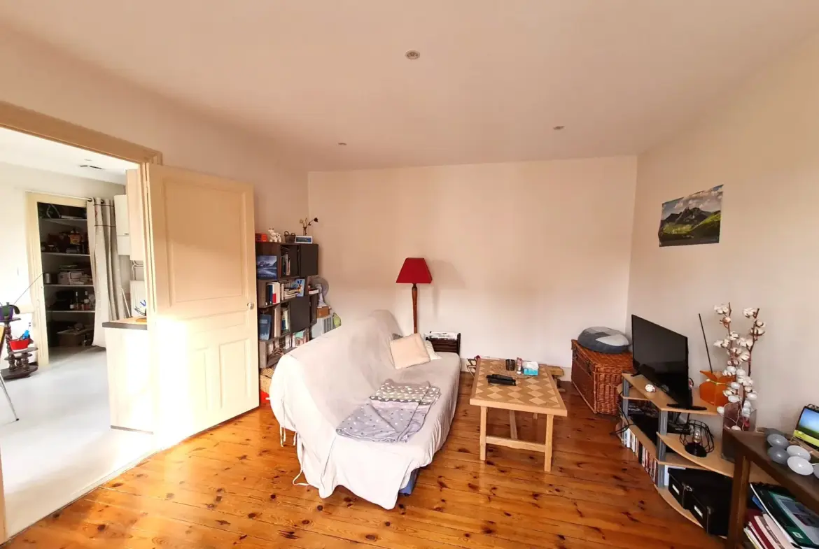 Appartement F2 à Roanne avec terrain et faibles charges - Investissement idéal 