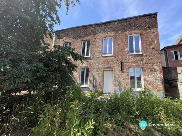 Maison à vendre à Fourmies avec jardin et potentiel de rénovation
