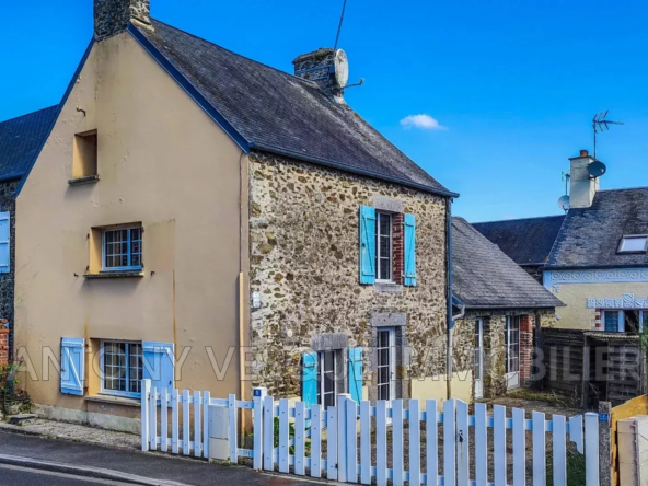 Charmante maison en pierre à Blainville-sur-Mer avec 3 chambres et jardin de 40 m²