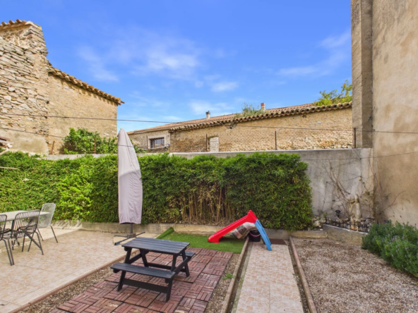 Belle maison de village avec garage et potentiel à Olonzac