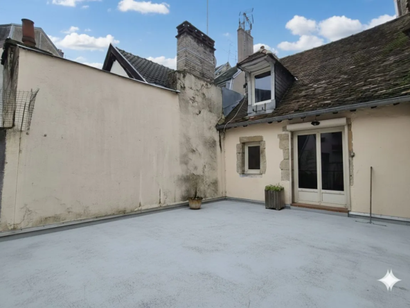 Appartement à rénover avec terrasse au cœur de Dijon - Charme et potentiel