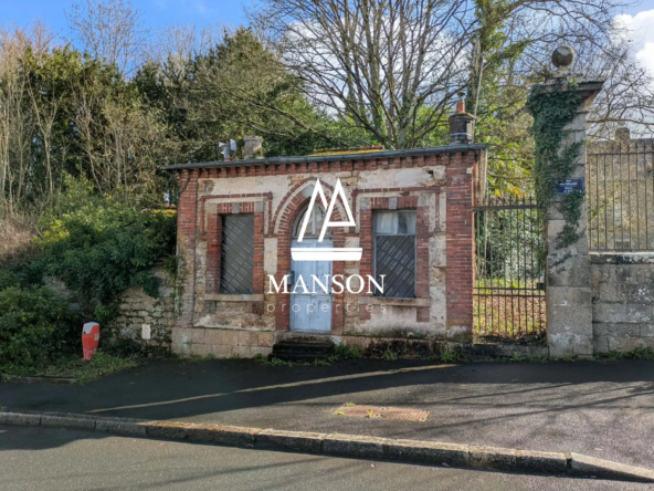 Maison de gardien avec grand terrain constructible à Guingamp