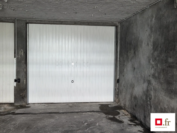 Garage souterrain sécurisé à Grenoble - Emplacement stratégique et porte neuve