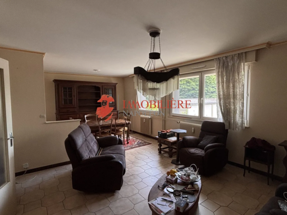 Appartement 3 pièces à Riedisheim avec garage et potentiel de rénovation