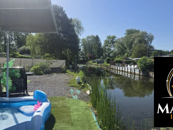 Chalet de loisir rénové à Fêchain avec jardin privé et stationnement