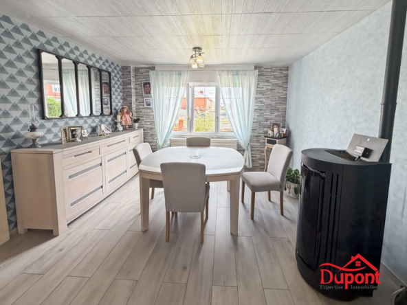 Maison familiale 100m² avec jardin et garage à Roeulx