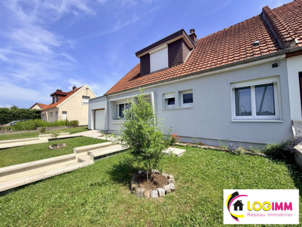 Charmante maison semi-individuelle à Boué avec terrasse, garage et jardin clos