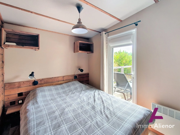 Chambre 1  Charmant chalet de 36 m² avec terrasse à Gujan-Mestras