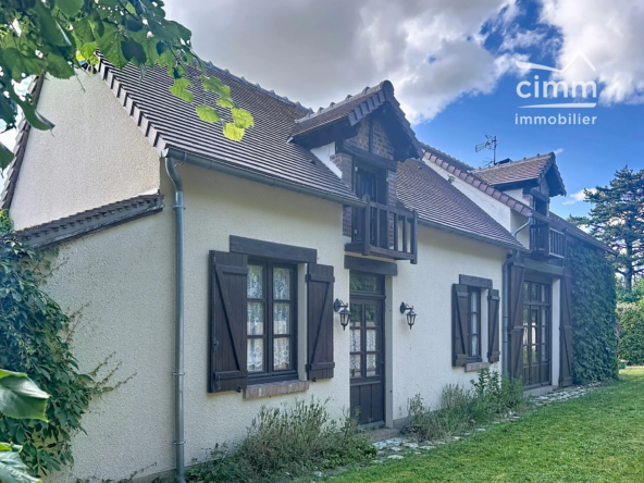 Maison traditionnelle à Saint Geneviève des Bois avec jardin et double garage