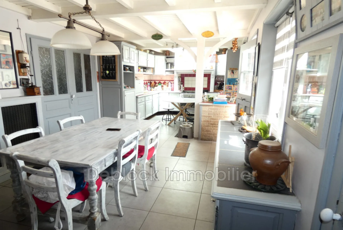 Maison mitoyenne semi plain-pied à vendre à Killem - 137,65 m² avec jardin et garages