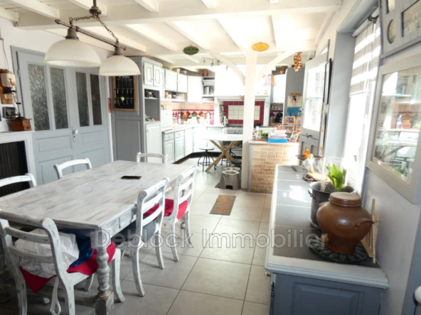 Maison mitoyenne semi plain-pied à vendre à Killem - 137,65 m² avec jardin et garages