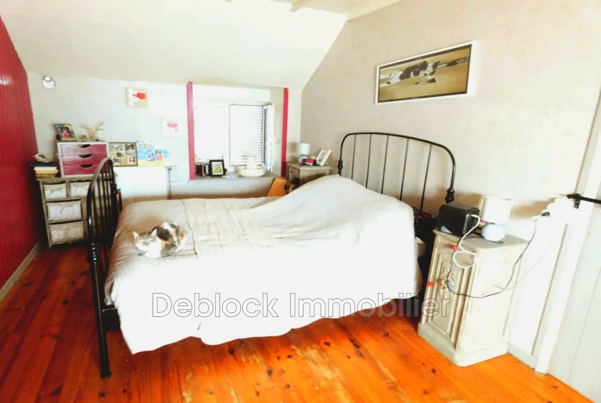 Maison mitoyenne semi plain-pied à vendre à Killem - 137,65 m² avec jardin et garages