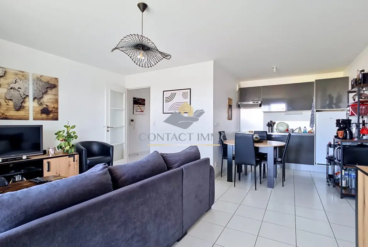 séjour/cuisine A vendre T2 lumineux de 48,2 m² avec balcon à Lanester 