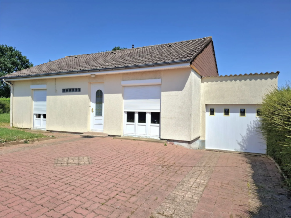 Maison de plain-pied à Aigné de 72,60 m² avec garage et terrain de 508 m²