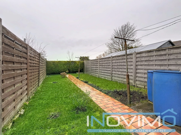 Maison à vendre à Spycker avec jardin et dépendance - 2 grandes chambres