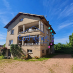 Maison de village à rafraîchir de 220 m² avec potentiel d'investissement à Cuinzier