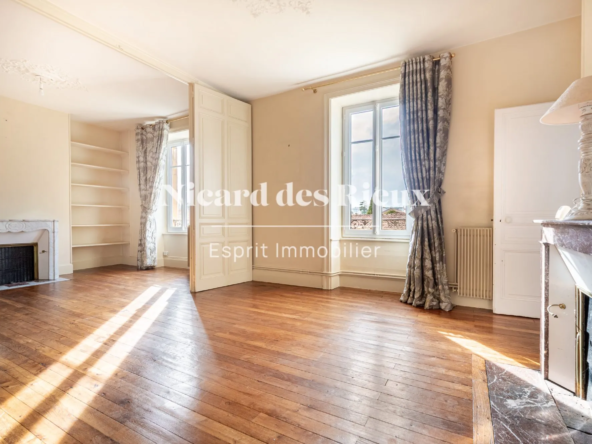 Appartement ancien avec 2 chambres à Limoges, chauffage individuel, cave et charme de l'ancien